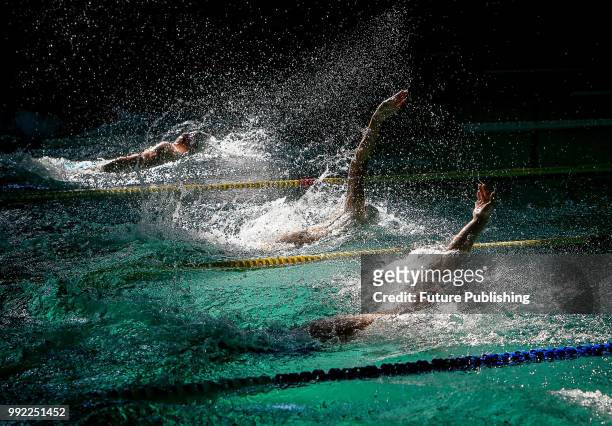 Swimmers perform during the Mr. Butterfly Swimming Cup of Ukraine tournament, Zaporizhzhia, southeastern Ukraine, July 4, 2018. Ukrinform.