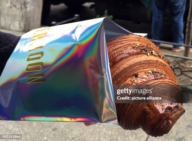 So-called 'NYC' , filled with salmon, fresh cheese or capers, which are directly baked into the croissant, lies on a table in New York, US, 16...