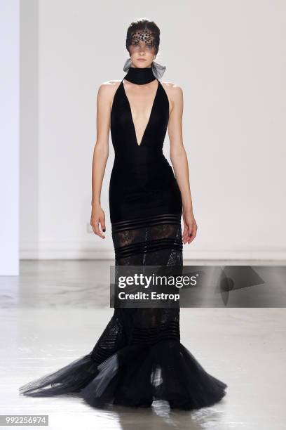 Model walks the runway during the Georges Chakra Haute Couture Fall Winter 2018/2019 show as part of Paris Fashion Week on July 3, 2018 in Paris,...