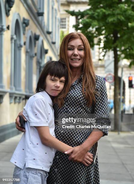 Billy Caldwell and his mother Charlotte pose together as they return to Belfast on July 5, 2018 in Belfast, Northern Ireland. Billy Caldwell who is...