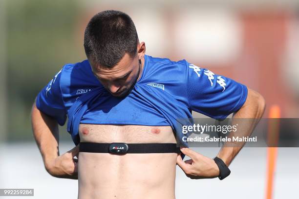 Frederic Veseli of Empoli FC adjusts his Polar heart rate monitor during training session of the 2018/2019 season during the New Shirt...