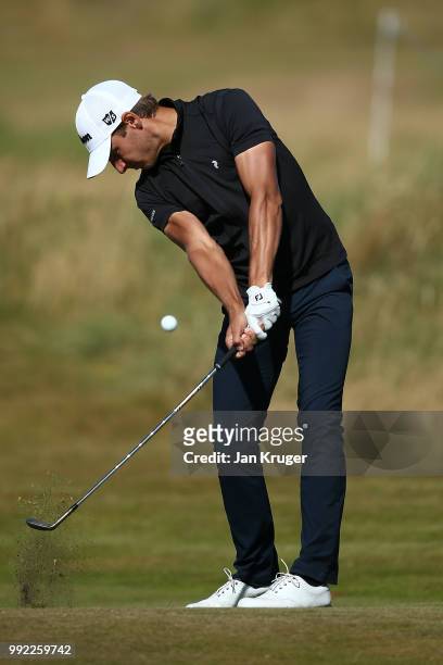 Joakim Lagergren of Sweden hits his second shot on the 8th hole during day one of the Dubai Duty Free Irish Open at Ballyliffin Golf Club on July 5,...