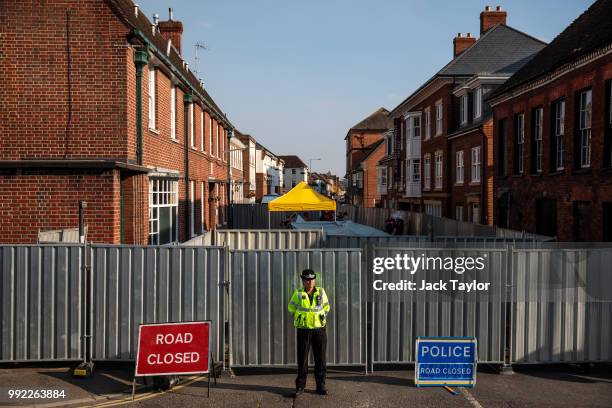 Police officer stands at a cordon around a supported housing project in Salisbury after a major incident was declared when a man and woman were...