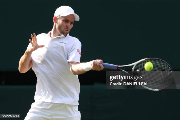 Player Bradley Klahn returns to Britain's Kyle Edmund in their men's singles second round match on the fourth day of the 2018 Wimbledon Championships...