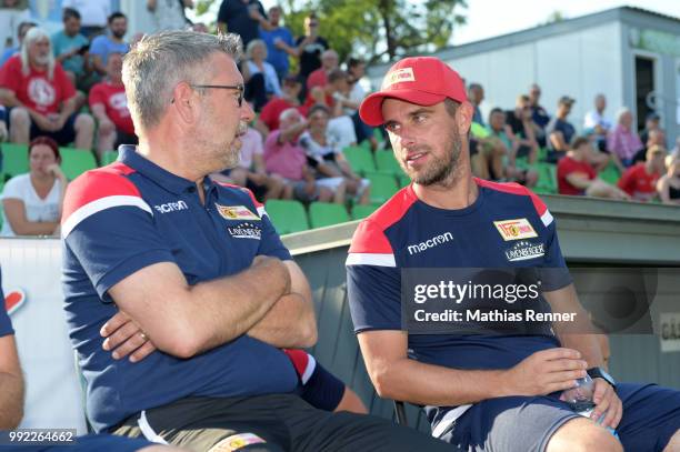 Coach Urs Fischer and assistant coach Sebastian Boenig of 1 FC Union Berlin chat during the test match between dem FSV Union Fuerstenwalde and Union...