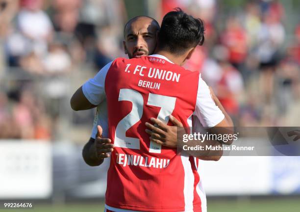 Akaki Gogia and Eroll Zejnullahu of 1 FC Union Berlin hug during the test match between dem FSV Union Fuerstenwalde and Union Berlin at the...