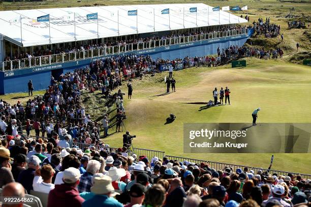 Paul Dunne of Ireland hits a putt on the 18th hole during day one of the Dubai Duty Free Irish Open at Ballyliffin Golf Club on July 5, 2018 in...