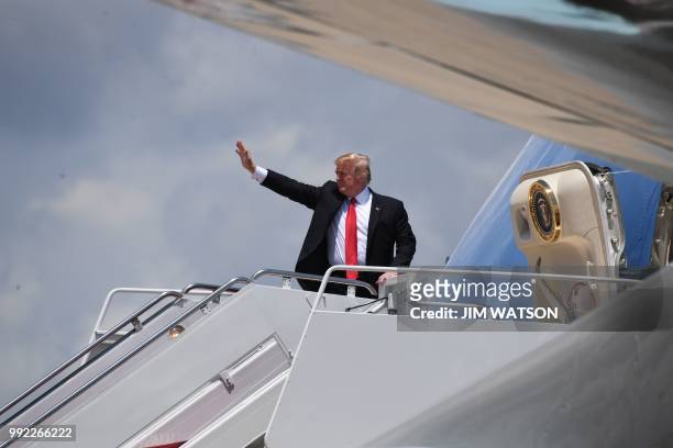 President Donald Trump boards Air Force One at Joint Base Andrews in Maryland on July 5, 2018. - Trump is travelling to Great Falls, Montana, for a...