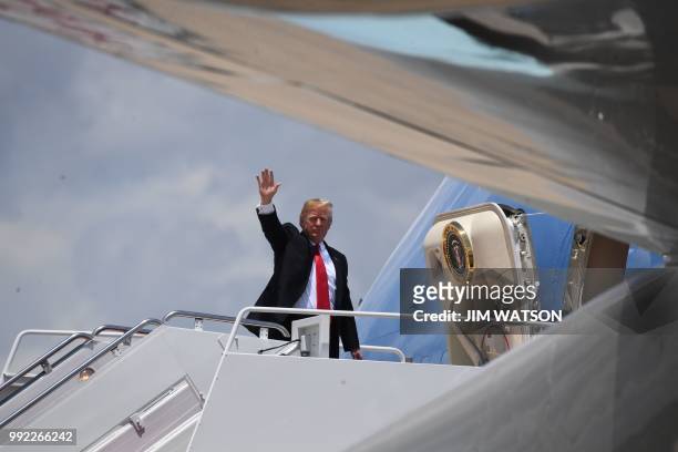 President Donald Trump boards Air Force One at Joint Base Andrews in Maryland on July 5, 2018. - Trump is travelling to Great Falls, Montana, for a...