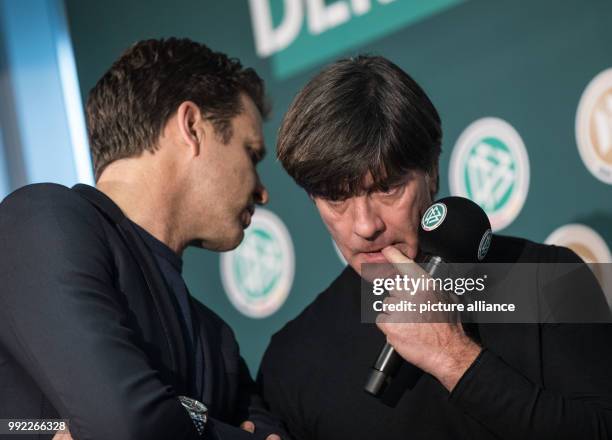 German national soccer team manger Oliver Bierhoff and head coach Joachim Low talking ahead of a press conference by the German Football Association...