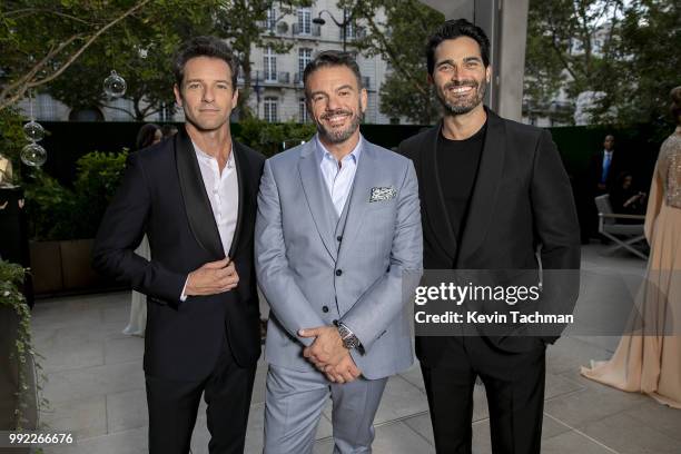 Ian Bohen, Eric Muscatell and Tyler Hoechlin attend the amfAR Paris Dinner at The Peninsula Hotel on July 4, 2018 in Paris, France.