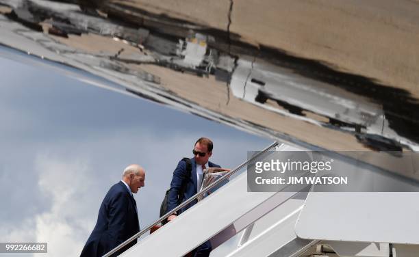 White House Chief of Staff John Kelly boards Air Force One at Joint Base Andrews in Maryland on July 5, 2018. - Kelly is accompanying US President...