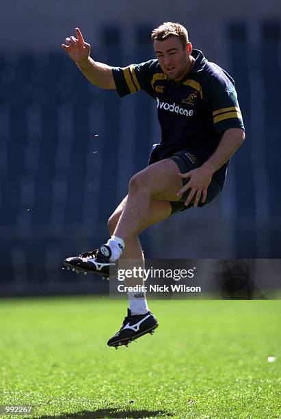 Chris Latham of Australia kicks during the Wallabies last training session at Subiaco Oval ahead of Saturday nights Tri Nations Rugby Test between...