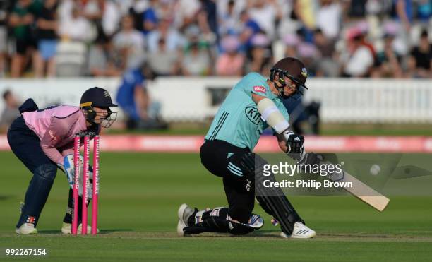 Sam Curran of Surrey hits a six during the Middlesex v Surrey Vitality T20 Blast match at Lord's Cricket Ground on July 5, 2018 in London, England.