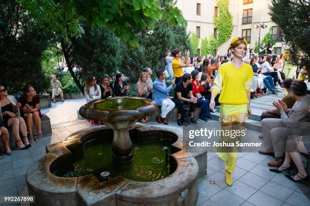 Model walks the runway at the Marcel Ostertag show during the Berlin Fashion Week Spring/Summer 2019 at Westin Grand Hotel on July 4, 2018 in Berlin,...