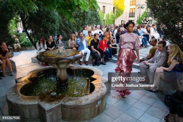 Model walks the runway at the Marcel Ostertag show during the Berlin Fashion Week Spring/Summer 2019 at Westin Grand Hotel on July 4, 2018 in Berlin,...