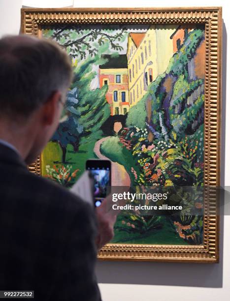 The painting 'Unser Garten mit Bluehenden Rabatten, 1912' by August Macke is exhibited in the museum of the August Macke Haus in Bonn, Germany, 30...