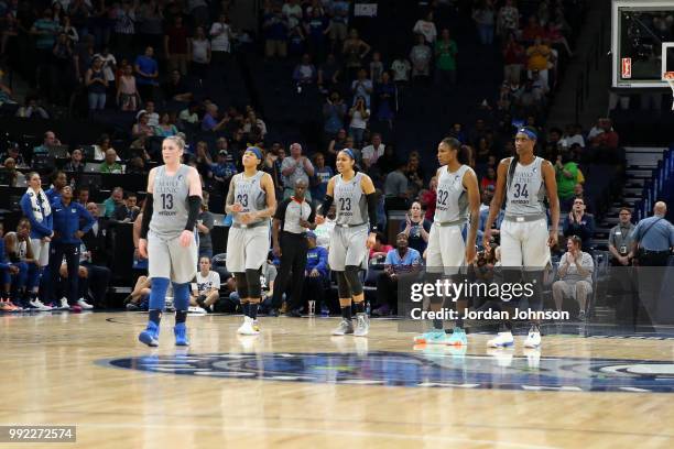 Lindsay Whalen , Seimone Augustus, Maya Moore , Rebekkah Brunson and Sylvia Fowles of the Minnesota Lynx look on during the game against the Indiana...