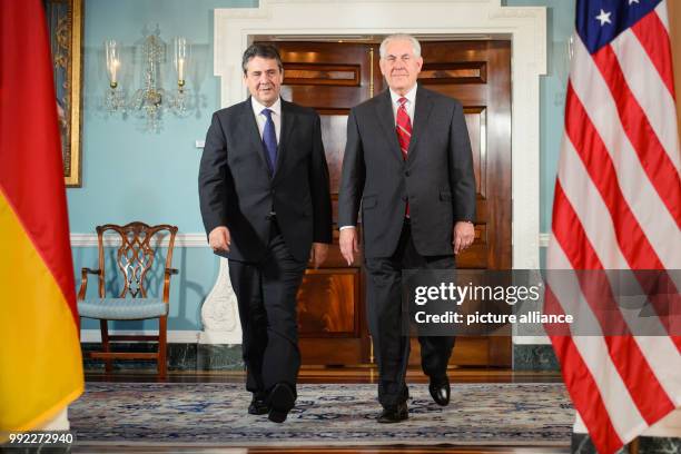 German Minister of Foreign Affairs Sigmar Gabriel and United States Secretary of State Rex Tillerson arrive for a press conference on the sidelines...