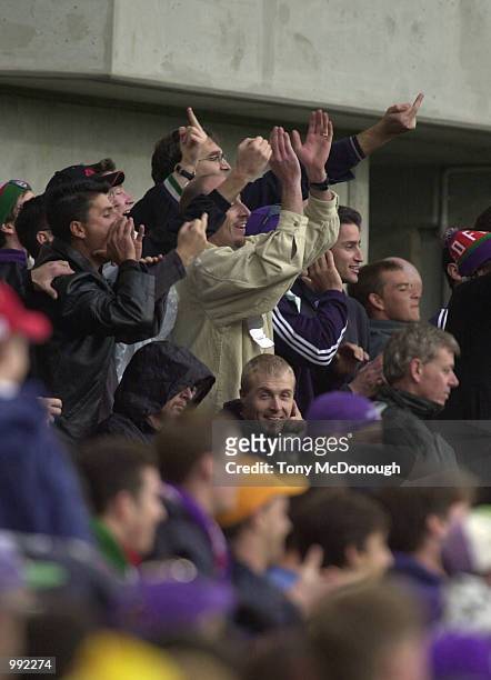 Group of angry Docker supporters jeer at the Fremantle team during 3 quarter time during the round 14 AFL match between the Fremantle Dockers and...