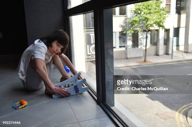 Billy Caldwell looks out of a hotel window on his return to Belfast on July 5, 2018 in Belfast, Northern Ireland. Billy Caldwell who is severely...