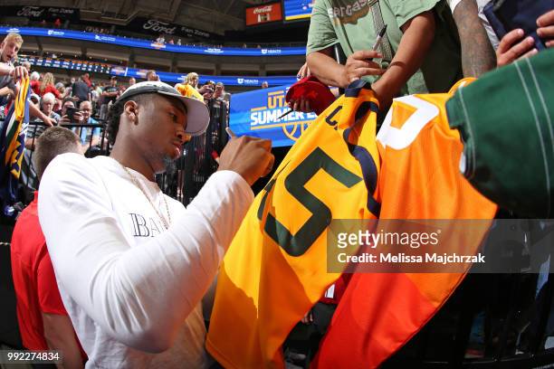 Donovan Mitchell of the Utah Jazz signs autographs for fans during the game against the Utah Jazz and Memphis Grizzlies on July 3, 2018 at Golden 1...