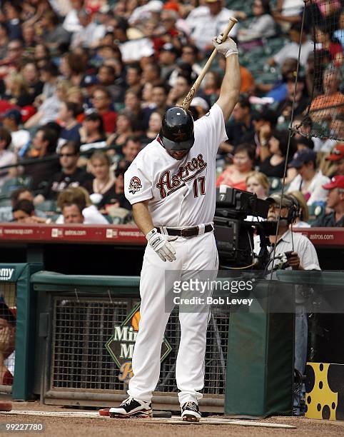 Lance Berkman of the Houston Astros bats during a baseball game between the San Diego Padres and Houston Astros at Minute Maid Park on May 8, 2010 in...