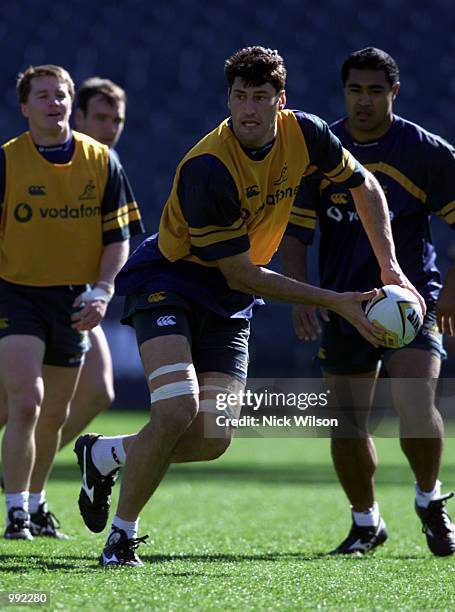 John Eales of Australia passes the ball during the Wallabies last training session at Subiaco Oval ahead of Saturday nights Tri Nations Rugby Test...