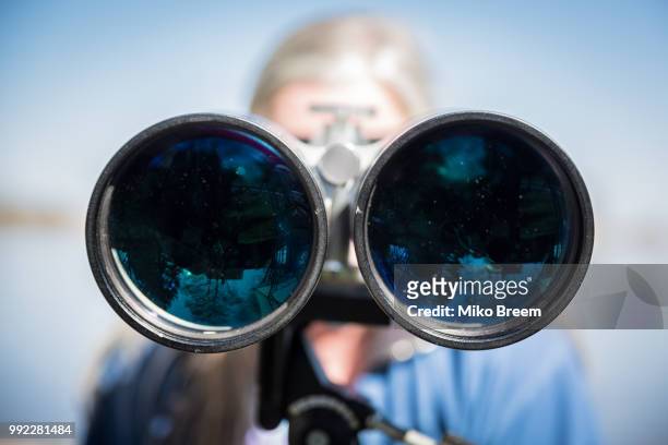 brake (unterweser), germany - looking through binoculars stock pictures, royalty-free photos & images