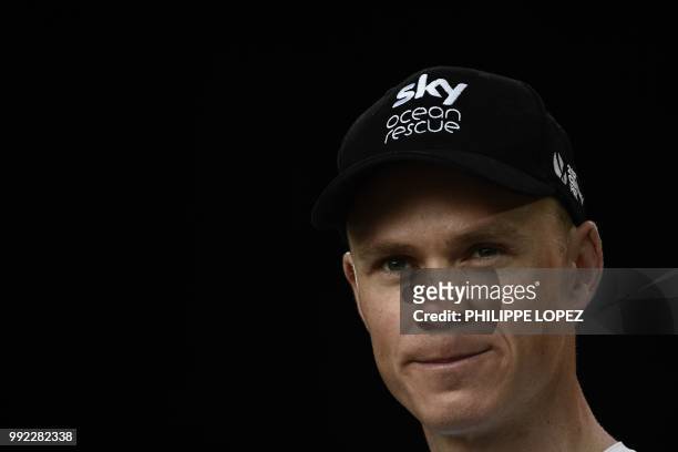 Great Britain's Christopher Froome of Great Britain's Team Sky cycling team poses on stage during the team presentation ceremony on July 5, 2018 in...