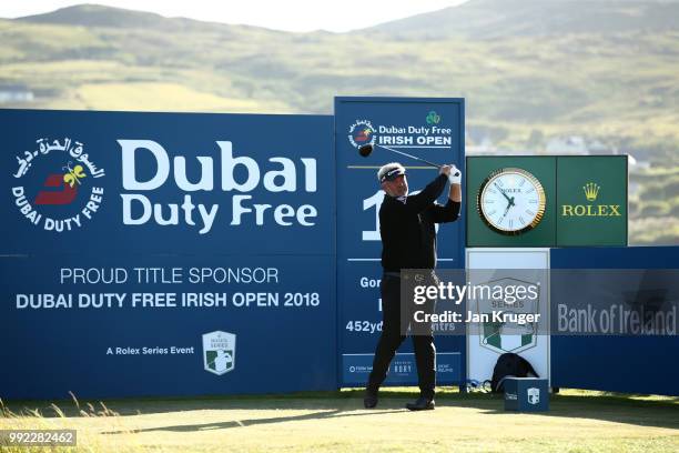 Darren Clarke of Northern Ireland tees off the 18th during day one of the Dubai Duty Free Irish Open at Ballyliffin Golf Club on July 5, 2018 in...