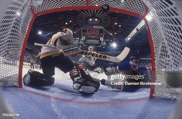 Net cam view of New York Rangers Alexei Kovalev in action, scoring goal vs Vancouver Canucks goalie Kirk McLean at Pacific Coliseum. Game 3....