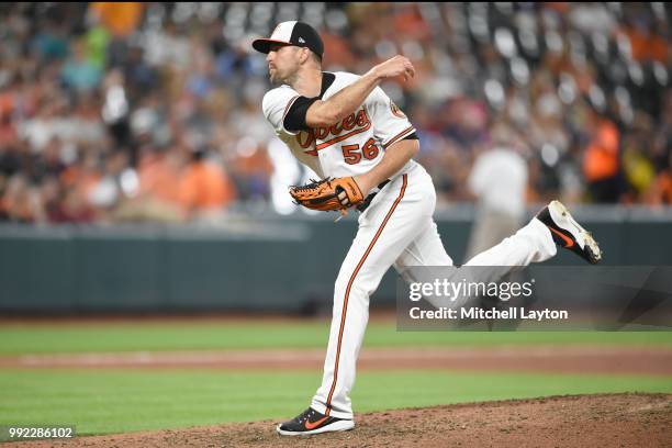 Darren O'Day of the Baltimore Orioles pitches during a baseball game against the Seattle Mariners at Oriole Park at Camden Yards on June 26, 2018 in...