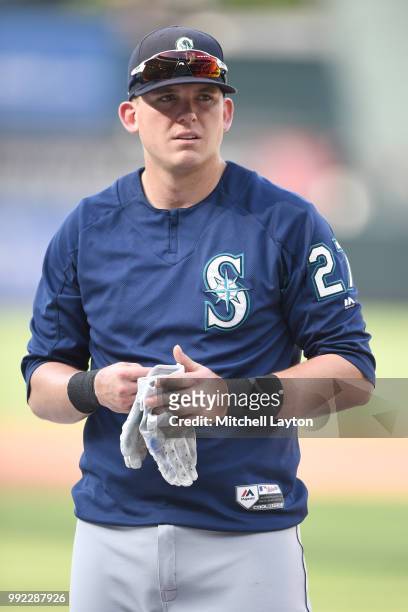 Ryon Healy of the Seattle Mariners looks on during batting practice of a baseball game against the Baltimore Orioles at Oriole Park at Camden Yards...