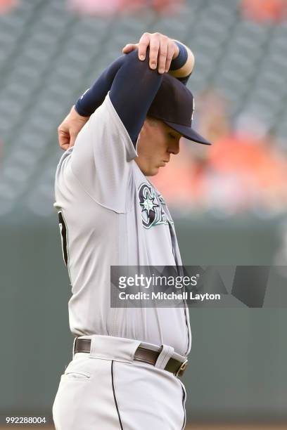 Ryon Healy of the Seattle Mariners warms up before a baseball game against the Baltimore Orioles at Oriole Park at Camden Yards on June 26, 2018 in...