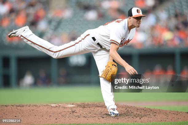 Kevin Gausman of the Baltimore Orioles pitches during a baseball game against the Seattle Mariners at Oriole Park at Camden Yards on June 26, 2018 in...