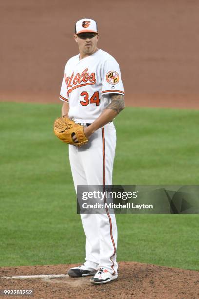 Kevin Gausman of the Baltimore Orioles pitches during a baseball game against the Seattle Mariners at Oriole Park at Camden Yards on June 26, 2018 in...