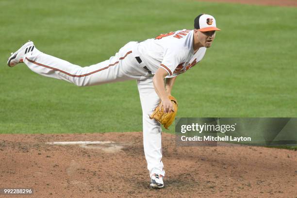 Kevin Gausman of the Baltimore Orioles pitches during a baseball game against the Seattle Mariners at Oriole Park at Camden Yards on June 26, 2018 in...