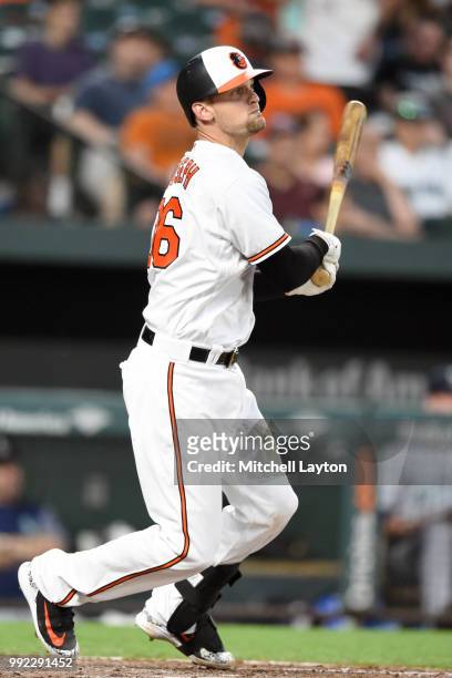 Caleb Joseph of the Baltimore Orioles takes a swing during a baseball game against the Seattle Mariners at Oriole Park at Camden Yards on June 26,...