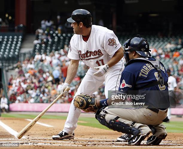 Lance Berkman of the Houston Astros bats during a baseball game between the San Diego Padres and Houston Astros at Minute Maid Park on May 8, 2010 in...