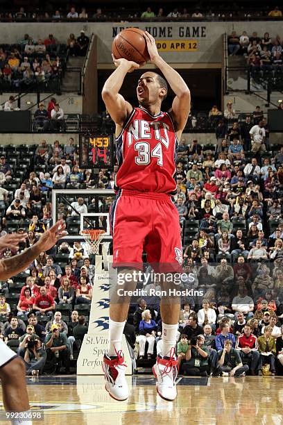 Devin Harris of the New Jersey Nets shoots a jump shot against the Indiana Pacers during the game at Conseco Fieldhouse on April 10, 2010 in...