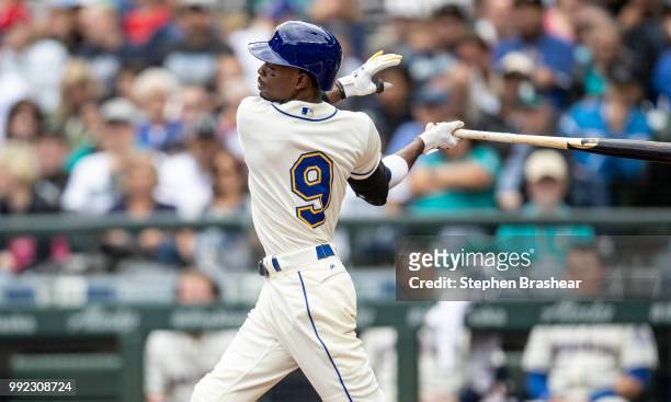 Dee Gordon of the Seattle Mariners takes as swing during an at-bat in a game against the Kansas City Royals at Safeco Field on July 1, 2018 in...