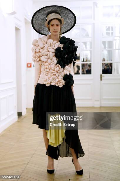 Model walks the runway during the Xuan Haute Couture Fall Winter 2018/2019 show as part of Paris Fashion Week on July 3, 2018 in Paris, France.