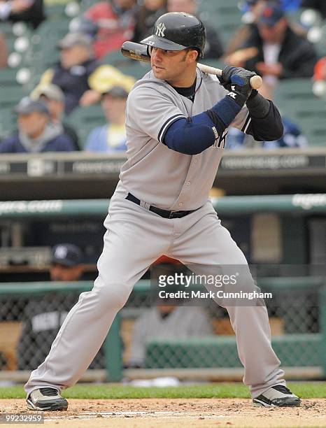 Nick Swisher of the New York Yankees bats during the first game of a double header against the Detroit Tigers at Comerica Park on May 12, 2010 in...