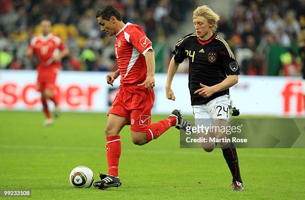 Andreas Beck of Germany and Roderick Briffa of Malta compete for the ball during the international friendly match between Germany and Malta at Tivoli...
