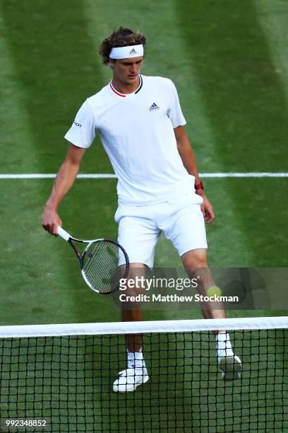 Alexander Zverev of Germany returns against Taylor Fritz of the United States duirng their Men's Singles second round match on day four of the...