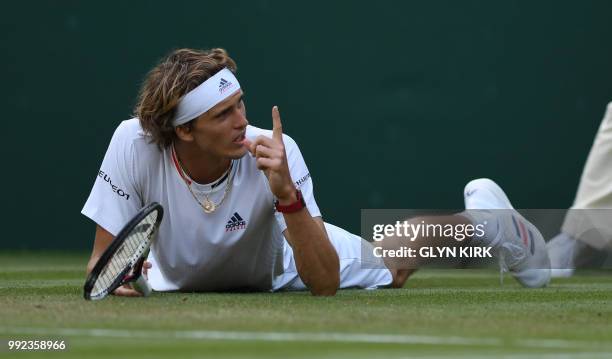 Germany's Alexander Zverev returns against US player Taylor Fritz during their men's singles second round match on the fourth day of the 2018...