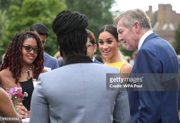 Meghan, Duchess of Sussex meets guests during the Your Commonwealth Youth Challenge reception at Marlborough House on July 05, 2018 in London,...