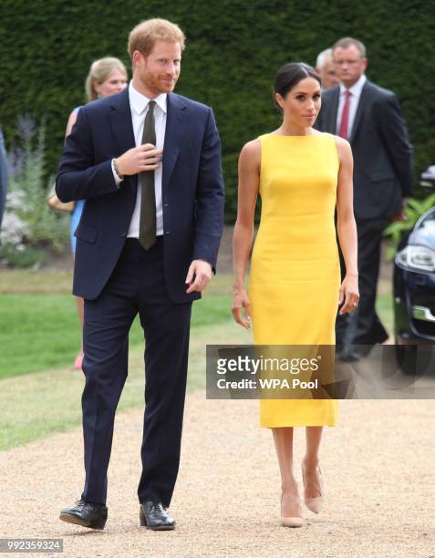 Prince Harry, Duke of Sussex and Meghan, Duchess of Sussex arrive to attend the Your Commonwealth Youth Challenge reception at Marlborough House on...