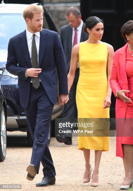 Prince Harry, Duke of Sussex and Meghan, Duchess of Sussex arrive to attend the Your Commonwealth Youth Challenge reception at Marlborough House on...